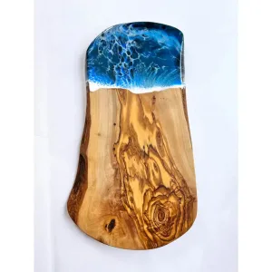 olive wood cutting board with blue epoxy wave