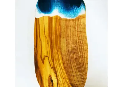 olive wood cutting board with ocean epoxy scene